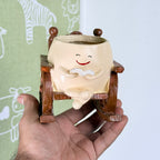 Cute Reading Smiley Rocking Chair Resin Planter Pot – Adorable Character Pot for Home & Desk Décor