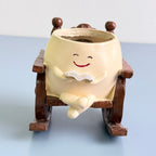 Cute Reading Smiley Rocking Chair Resin Planter Pot – Adorable Character Pot for Home & Desk Décor
